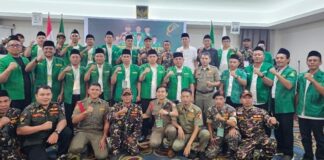 Momen foto bersama Ketua PW GP Ansor Sulut Yusra Alhabsyi dan para pengurus PW GP Ansor se Sulut, di Sutan Raja Hotel, Kotamobagu, Kamis 17 April 2025. (foto.yudi/timurexpress.co)