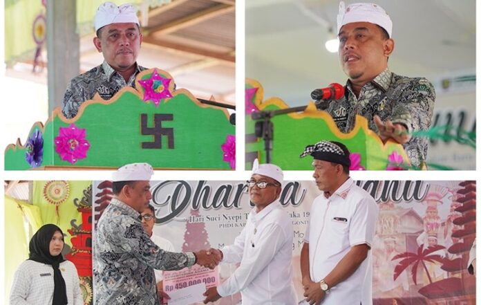 timurexpress.co Bupati Bolmong, Yusra Alhabsyi, saat menghadiri perayaan Dharma Santi Umat Hindu, di Desa Kembang Merta, Amerta Sari, Kecamatan Dumoga Timur, Rabu 21 Mei 2025. (foto.Ist/Diskominfo Bolmong)