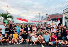 Semarak HUT Kemerdekaan RI ke 80, Momen foto bersama Sangadi Roliadi Modeong, pemuda Karang Taruna, dan masyarakat Desa Moyag Todulan, Kecamatan Kotamobagu Timur, Kota Kotamobagu, Minggu 17 Agustus 2025. (foto.Penggi/terasgorontalo)