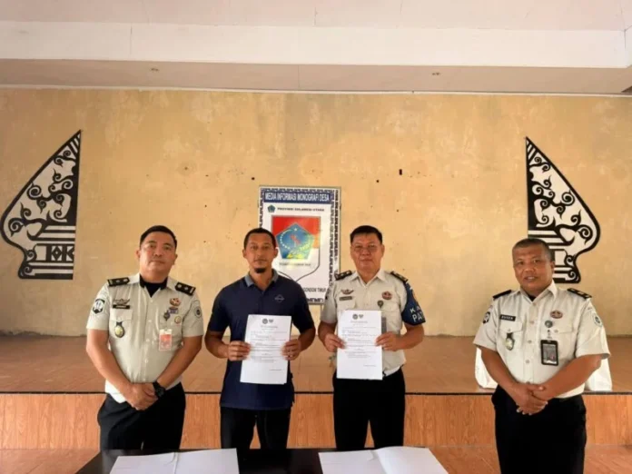 Rutan Kotamobagu MoU Desa Liberia Rutan Kelas IIB Kotamobagu saat melakukan pendatanganan kerja sama terkait program pembinaan serta pemberdayaan masyarakat, di Kantor Desa Liberia, Selasa 7 Mei 2026. (foto.dok/Rutan Kotamobagu)