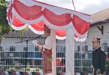 Rutan Kotamobagu Peringati Harganas ke-33, Aris Yuliyanta Gaungkan Tema “Ayah Wajib Hadir” Karutan Kotamobagu, Aris Yuliyanta, saat membacakan amanat Menteri di Peringatan Hari Keluarga Nasional (Harganas) ke-33 Tahun 2026 di Lapangan Rutan Kotamobagu, Senin (29/6/2026). (foto.Ilham/Rutan Kotamobagu)